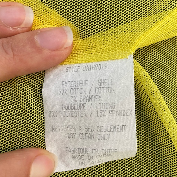 Knee length black dress with yellow accents - Picture 6 of 9